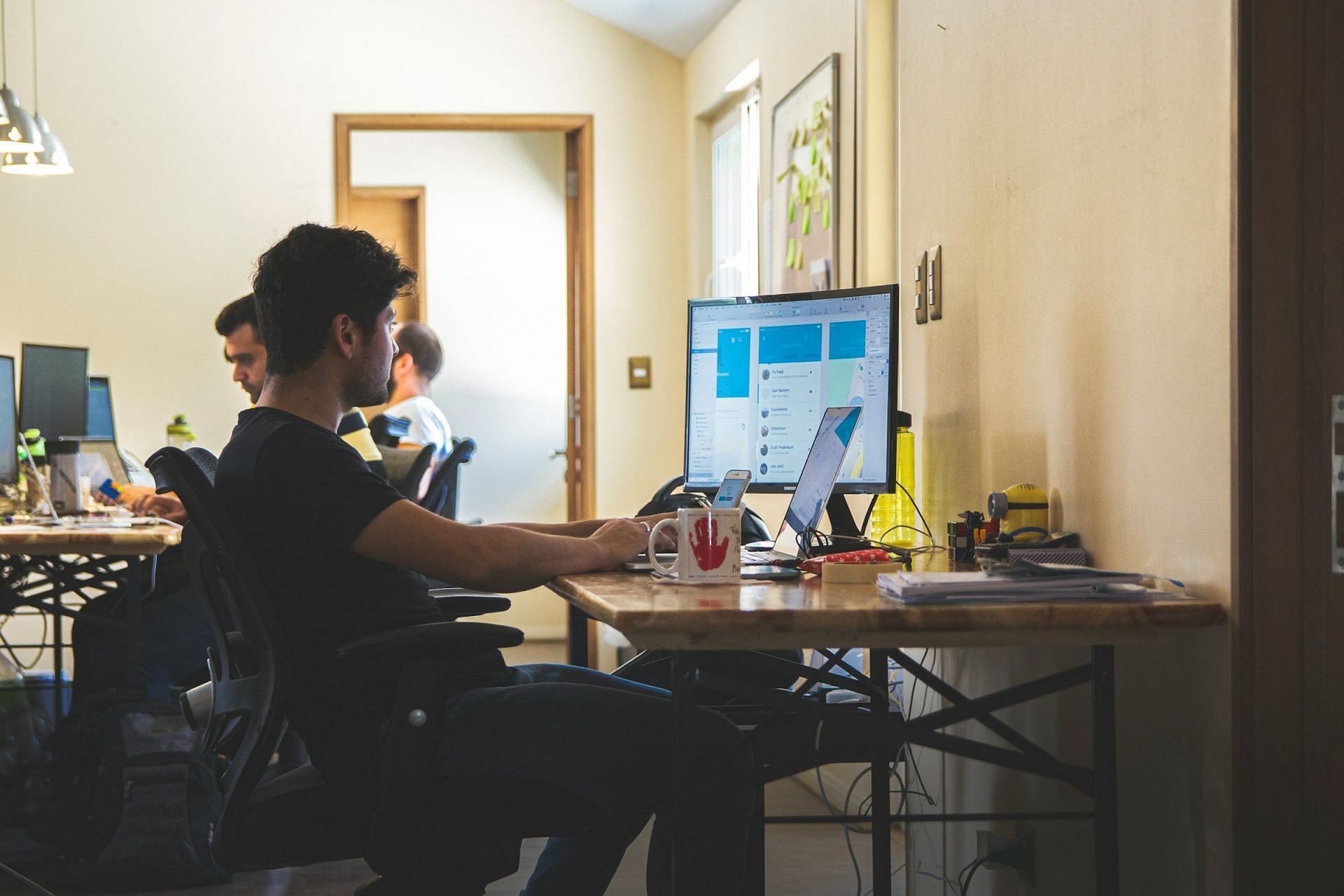 Desk Exercises (Image via Unsplash/Alvaro Reyes)